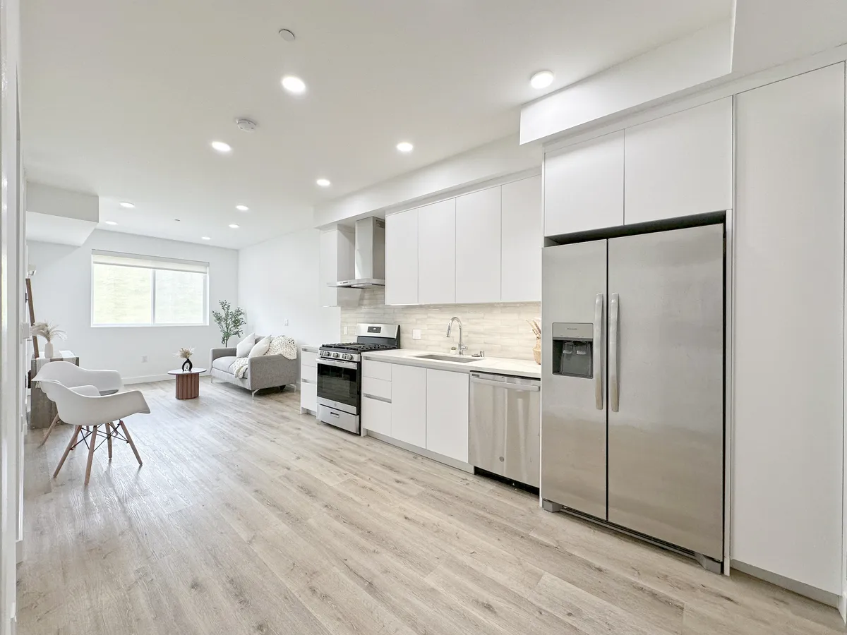 Living room in a 1-bedroom at 3737 Motor Ave — affordable apartments in West Los Angeles