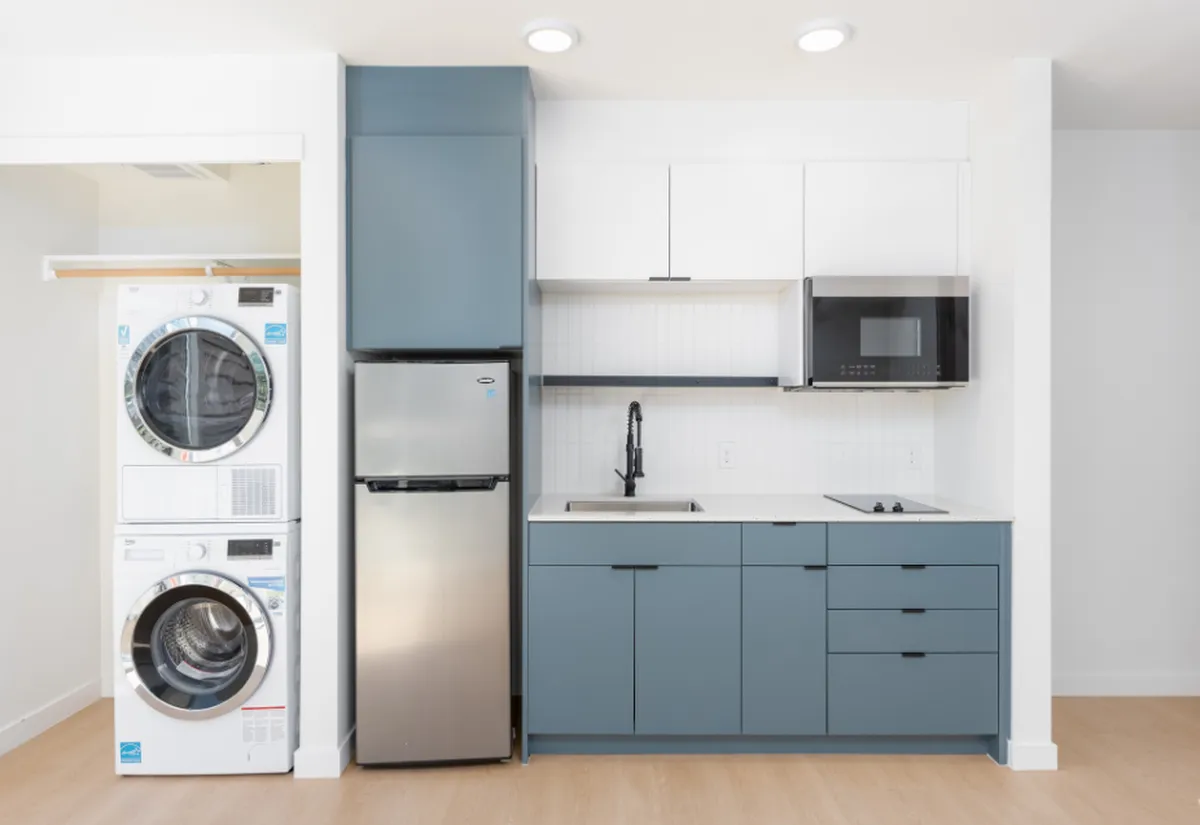 In-unit washer and dryer in a 1-bedroom at Sora Apartments in Seattle