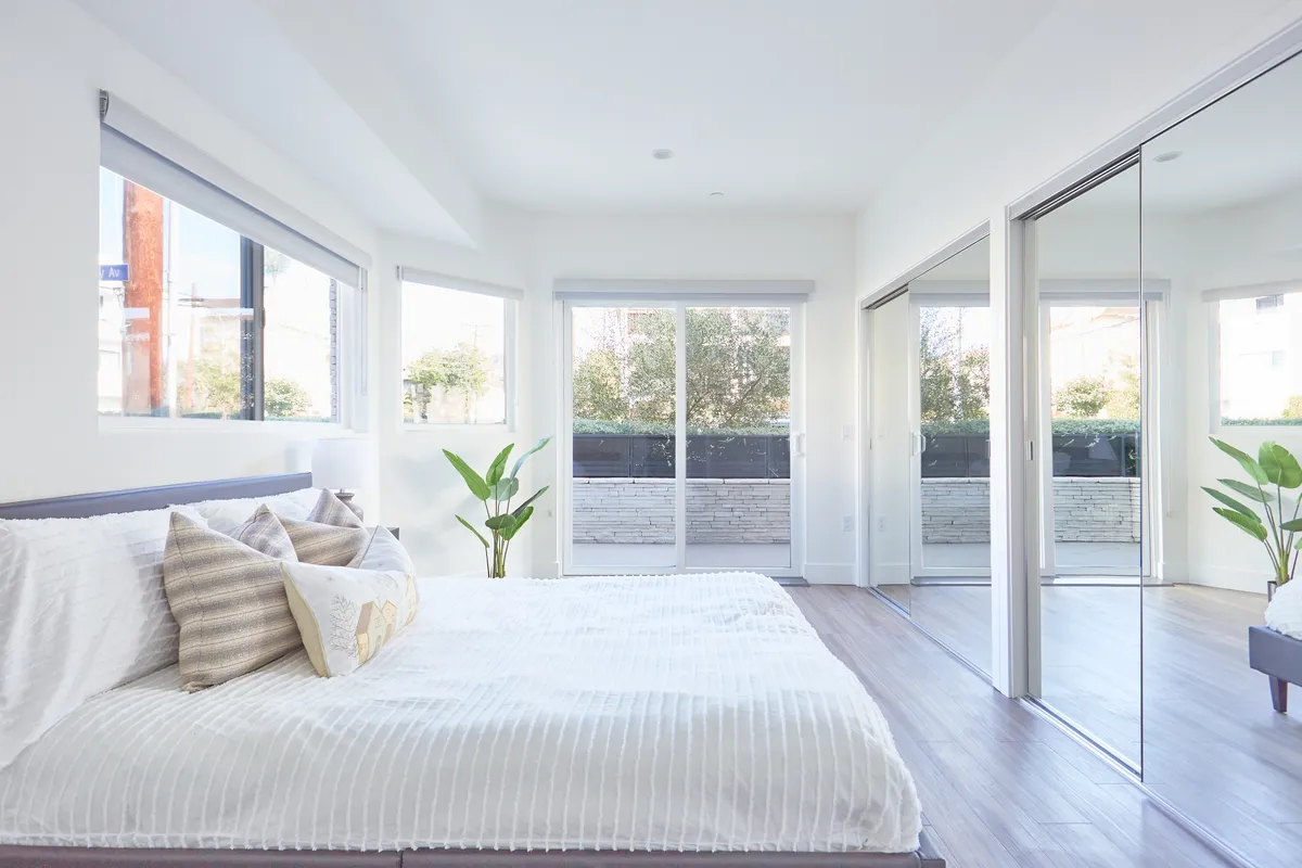Interior of a bedroom in the 1515 Colby Ave apartment